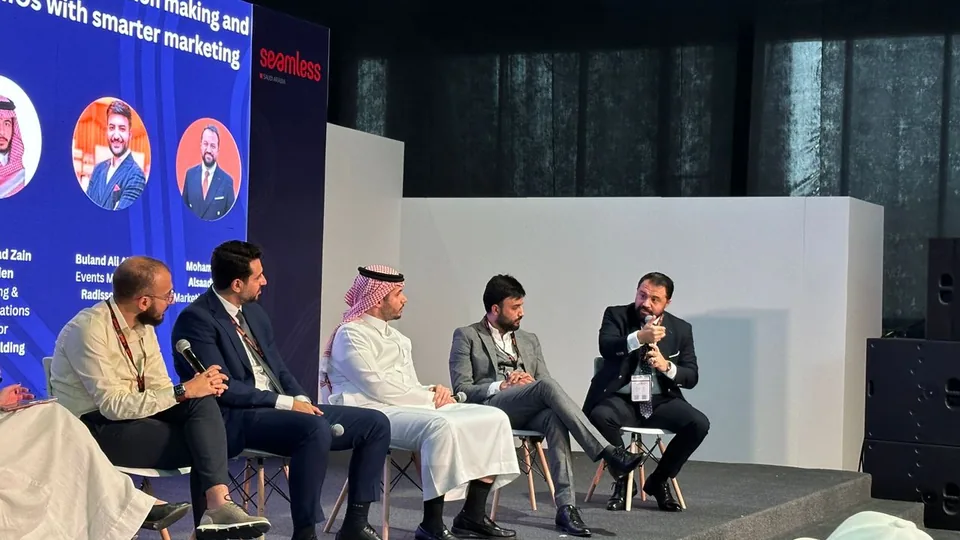 Dr. Mohammad Alsaadany (right) speaking on the AI for CMOs panel at Seamless Saudi Arabia